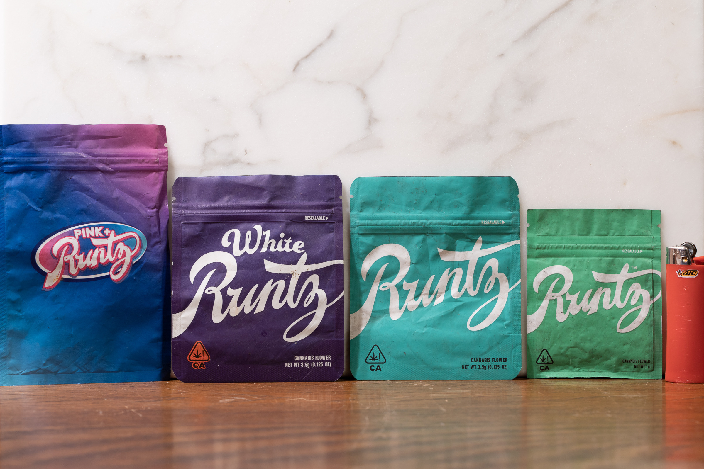 Runtz weed strain near me - vibrant frosty Runtz OG buds with purple and green hues 2026